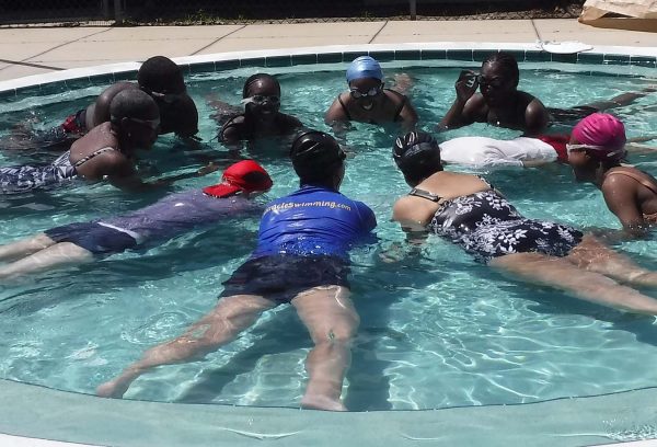 adults learn to swim by overcoming fear of water and fear of swimming