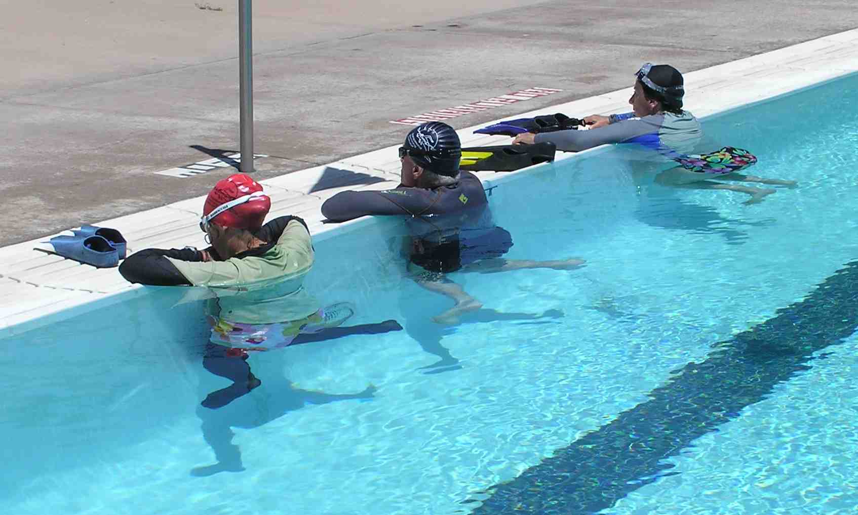 adults learn to swim by overcoming fear of deep water and fear of swimming