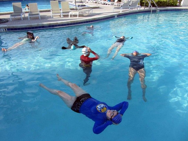 learn to swim with adult swimming lessons for adults who are afraid or have fear of deep water