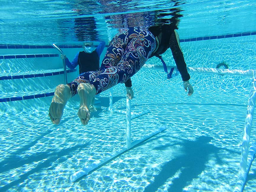 learn to swim with adult swimming lessons for adults who are afraid or have fear of deep water
