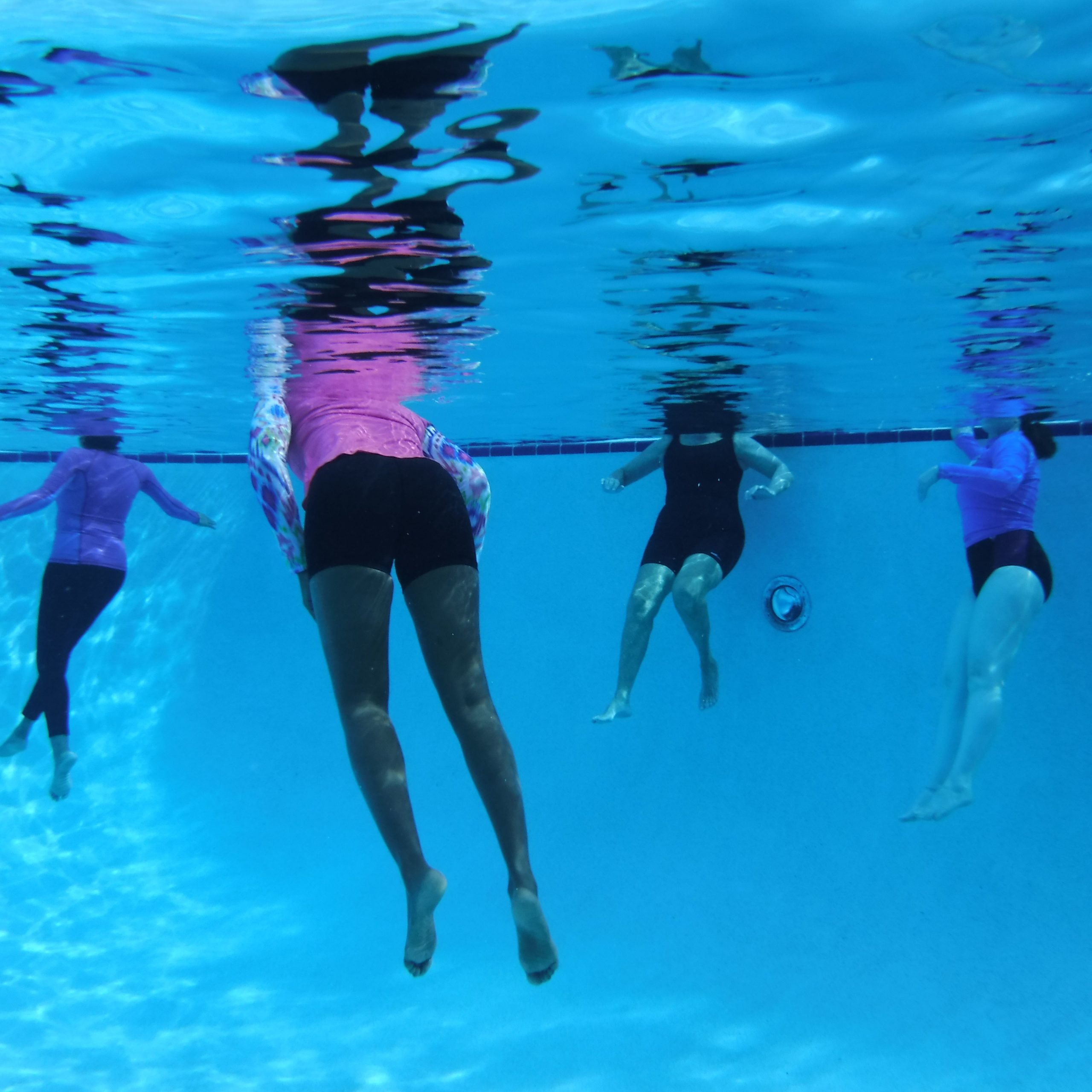 learn to swim with adult swimming lessons for adults who are afraid or have fear of deep water