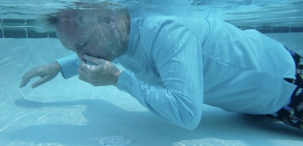 axel uw ff holds nose, eyes closed 2ft cropt copy 2